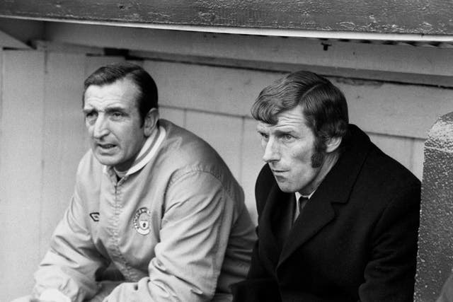 Tony Book, right, during his time as caretaker manager of Manchester City, alongside coach Ken Barnes