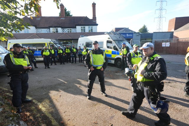 Police outside the Bell Hotel in Epping, Essex