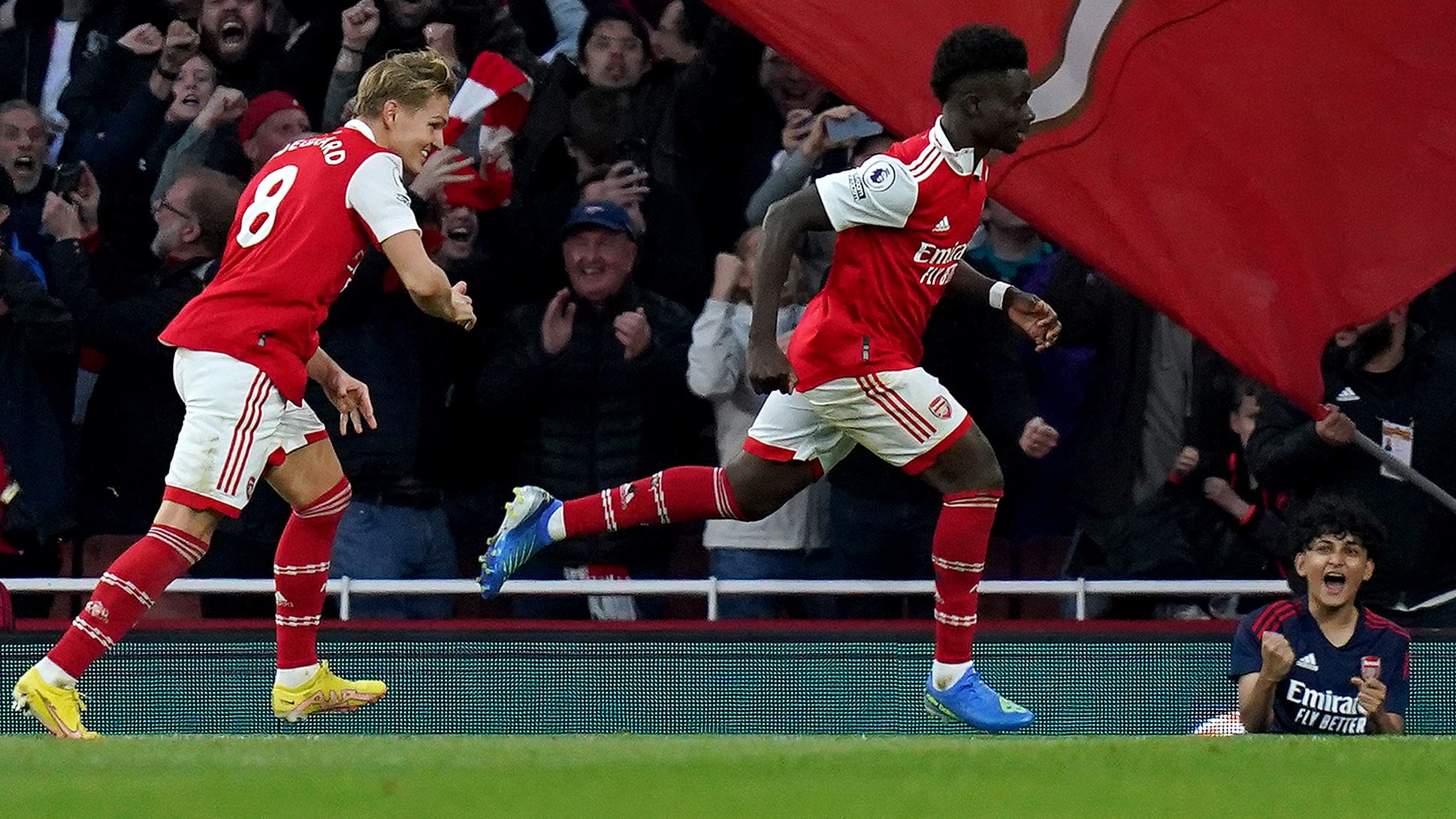 Arsenal’s Bukayo Saka (right) celebrates after scoring the winner against Liverpool (Adam Davy/PA)