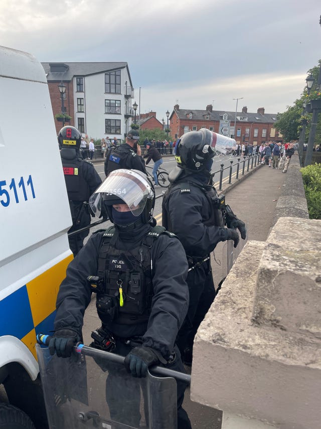 Riot police block a road close to Clonavon Terrace in Ballymena on Wednesday night 