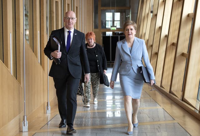 Nicola Sturgeon in the Scottish Parliament walking into the chamber