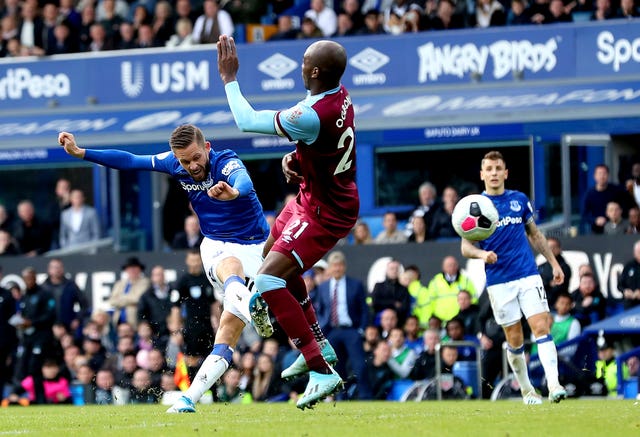 Gylfi Sigurdsson (left) scores a superb second