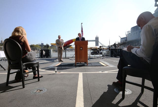 Defence Secretary Ben Wallace with Chief of Defence Staff General Sir Nick Carter speaking to assembled press during his visit to HMS Tamar in London