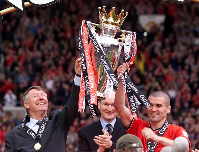 Keane, right, won four English league titles under manager Sir Alex Ferguson, left 