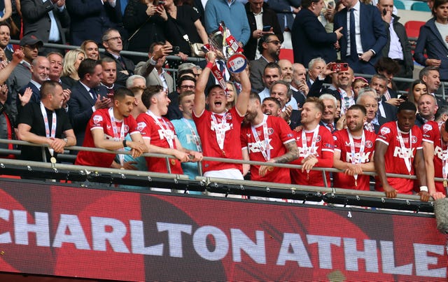 Charlton lift the trophy after winning the League One play-off final