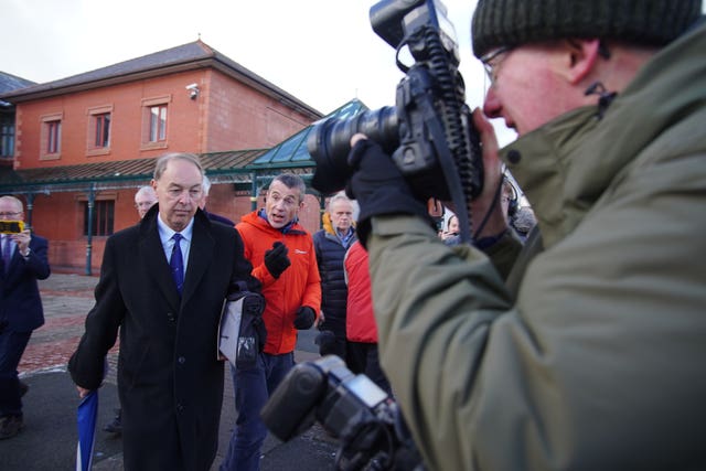 Jonathan Carley surrounded by members of the media while he is leaving Llandudno Magistrates’ Court