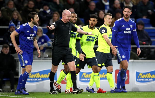 Lee Mason overturned a penalty decision after talking to his assistant