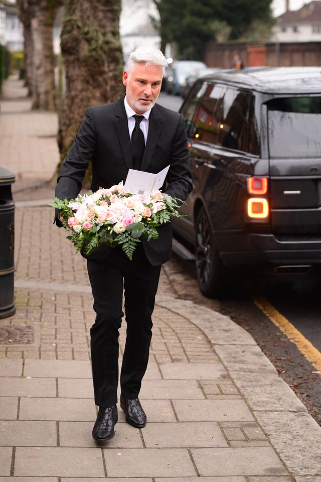 Hair and make-up artist Gary Cockerill arrives at Golders Green Crematorium, north London, for the private funeral service of Dame Barbara Windsor