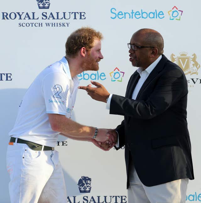 Harry and Prince Seeiso during the prize giving ceremony after taking part in a fundraising polo match (Chris Radburn/PA)