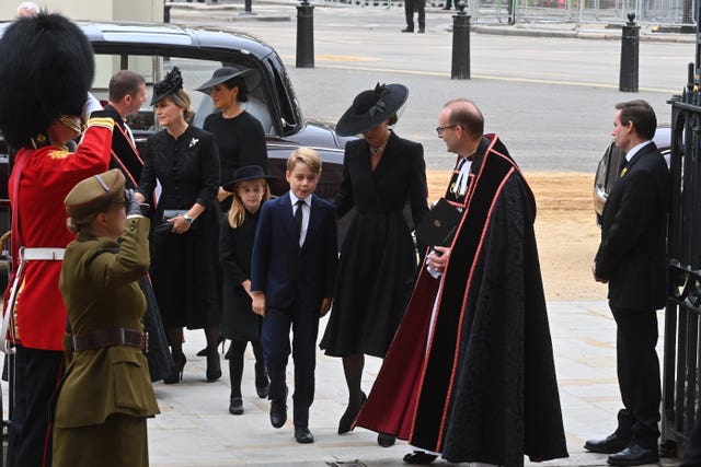 The children arrived with their mother and the Duchess of Sussex (Geoff Pugh/Daily Telegraph/PA)