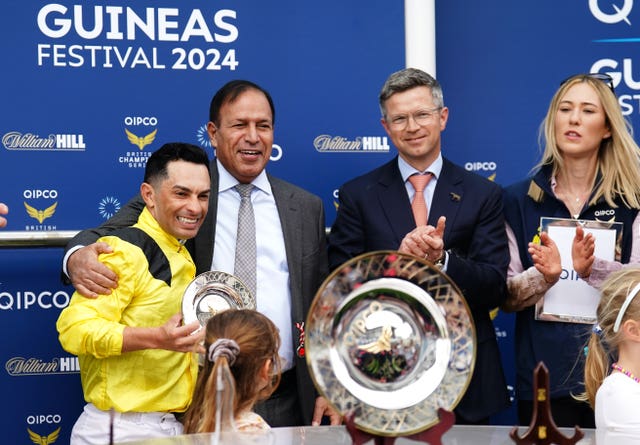 Silvestre De Sousa (left) with winning connections