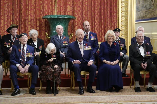 Veterans sitting with the King and Queen at Windsor Castle