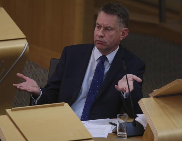 Murdo Fraser in Holyrood with his arms out in a questioning stance