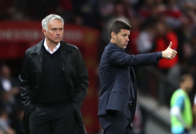 Mourinho (left) alongside Tottenham boss Mauricio Pochettino