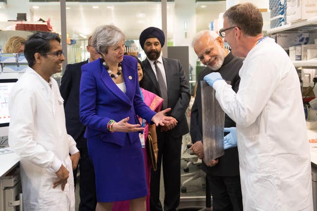 Theresa May visited the Francis Crick Institute earlier this year with Indian counterpart Narendra Modi (Stefan Rousseau/PA)