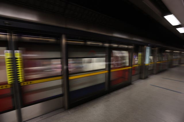 A Tube train departs the station at Westminster underground station (James Manning/PA)