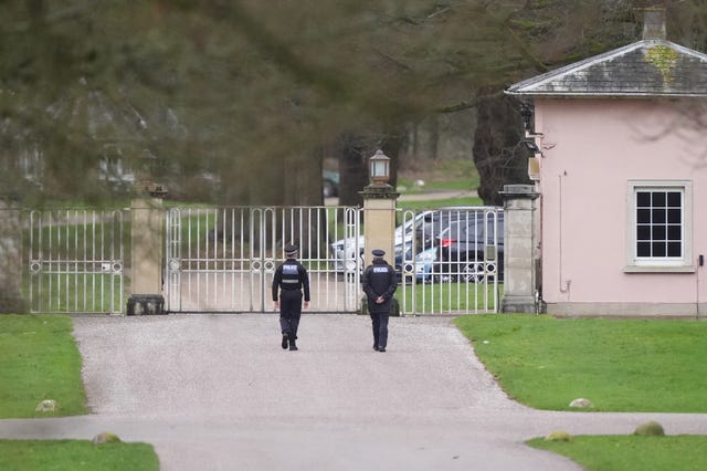 Police officers at Royal Lodge, the former home of Andrew Mountbatten-Windsor in Windsor Great Park, Berkshire