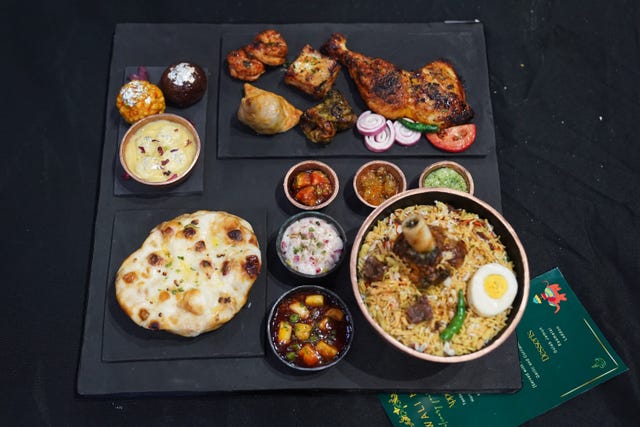 A cake depicting a selection of dishes from an Indian takeaway