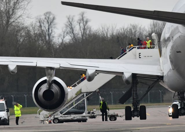 Passengers disembark at RAF Brize Norton in Oxfordshire 