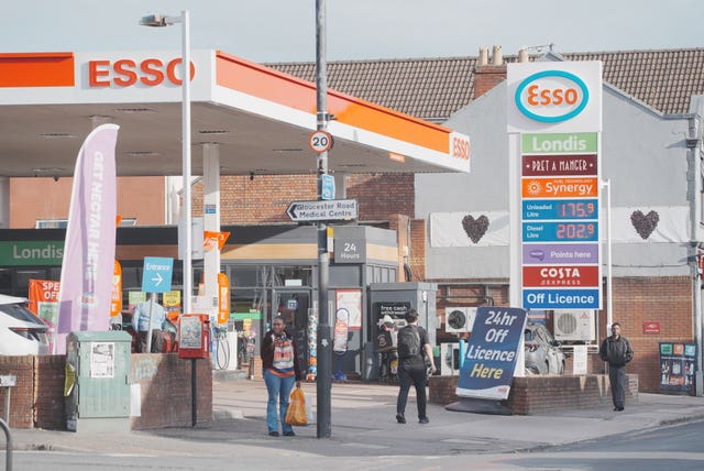A view of a fuel station, showing the prices