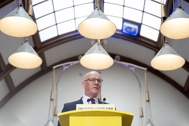 SNP leader John Swinney delivers a speech on the early actions a re-elected SNP Government would take to support people, at the Pearce Institute, Glasgow