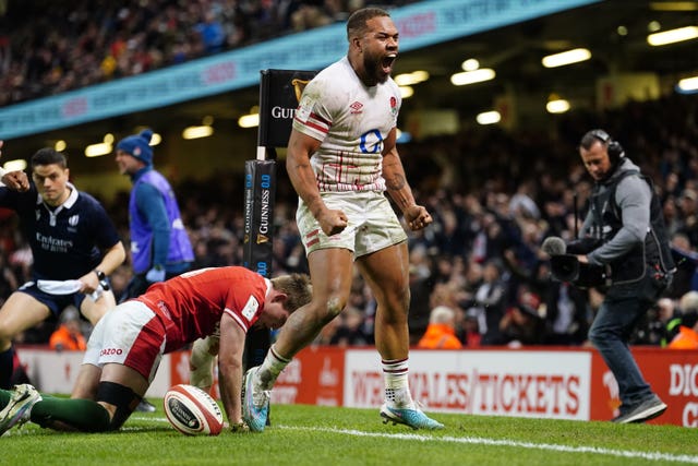 Ollie Lawrence celebrates after scoring a try against Wales in round three