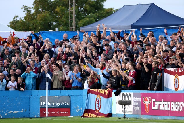 Aston Villa fans celebrate Cameron Archer's opener at Barrow 