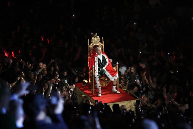Tyson Fury poses on a throne during his ring walk ahead of fighting Deontay Wilder in Las Vegas. British boxer Fury produced a stunning performance of patience and power to stop the American in the seventh round and finally win the WBC world heavyweight title. Fourteen months on from a controversial draw between the fighters, the 'Gypsy King' floored his opponent twice before Wilder's corner threw in the towel.