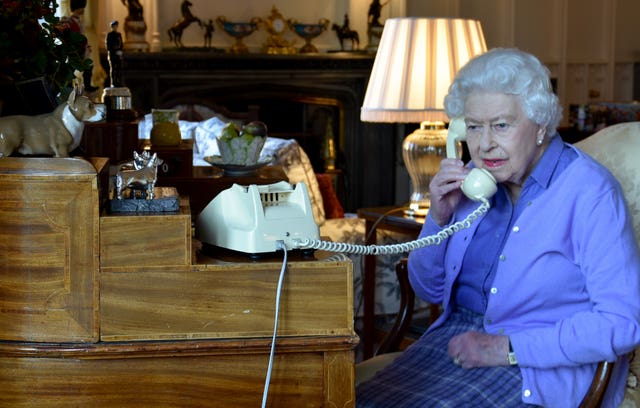 The Queen has been conducting some of her duties by phone due to the lockdown and is pictured holding her weekly audience with Prime Minister Boris Johnson. PA Media
