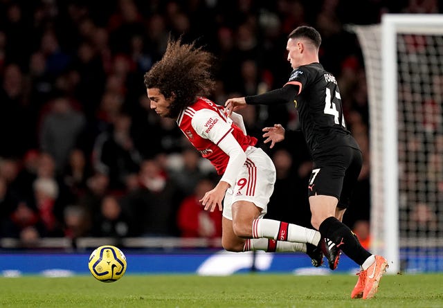 Phil Foden, right, lasted 56 minutes on his first Premier League start of the season