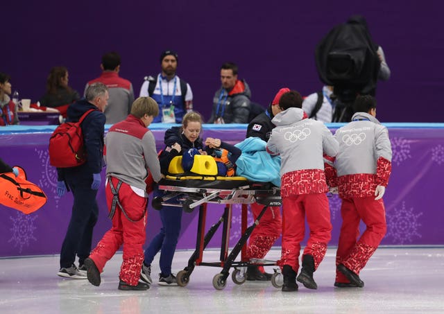 Great Britain’s Elise Christie (left) crashes out in the short track speed skating semi-finals 