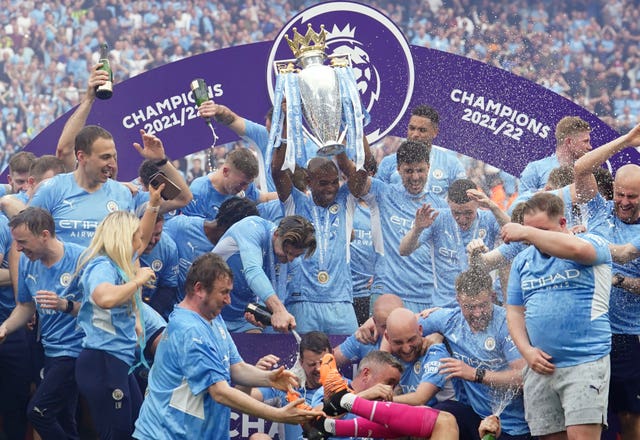 Manchester City’s Fernandinho lifts the Premier League trophy