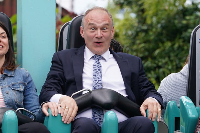 Liberal Democrats leader Sir Ed Davey takes on the Rush ride during a visit to Thorpe Park in Chertsey, Surrey, whilst on the General Election campaign trail 