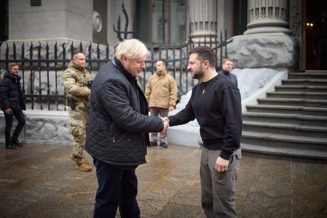 Boris Johnson shakes hands with Volodymyr Zelensky