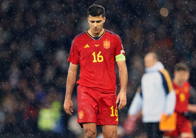 Rodri looks dejected following the defeat by Scotland