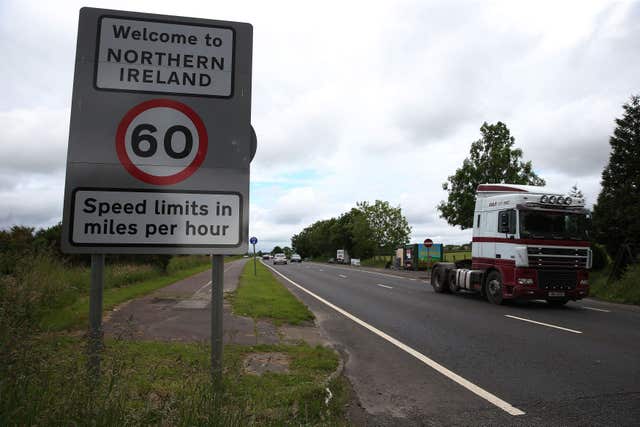 Traffic crosses the border between the Republic of Ireland and Northern Ireland in the village of Bridgend, Co Donegal 