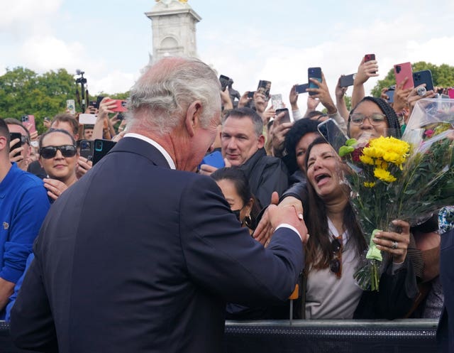 King Charles III is greeted by well-wishers