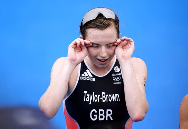 Georgia Taylor-Brown wipes away tears after crossing the line