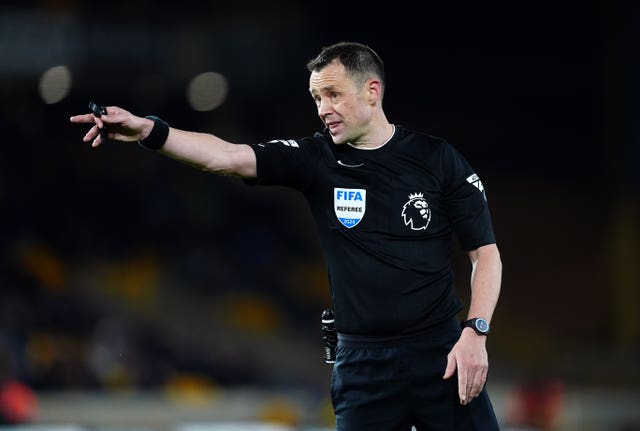Stuart Attwell refereeing a Premier League match between Wolves and Bournemouth 