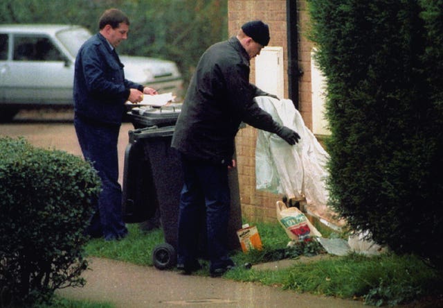 Police searching the Welland Estate, Peterborough, following the murder of six-year-old Rikki Neave (PA)