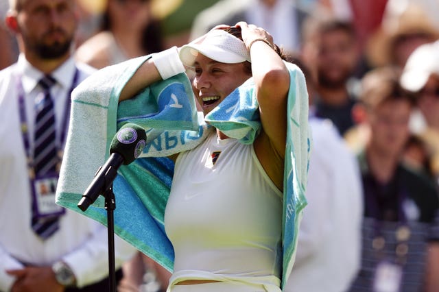 Amanda Anisimova looks in disbelief as she celebrates victory over Aryna Sabalenka