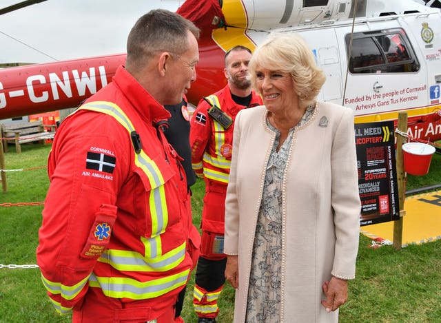 Camilla meets a member of the Cornwall Air Ambulance 
