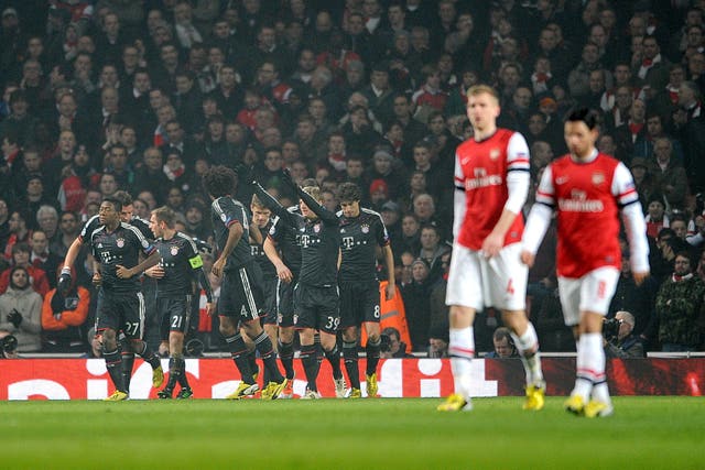 Arsenal’s Mikel Arteta (right) and Per Mertesacker were unable to help the Gunners beat the best in Europe.