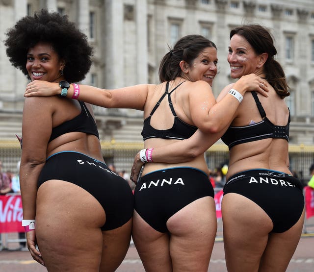 Shareefa J, Anna Harding and Andrea McLean pose for a photograph after running the Vitality London 10000