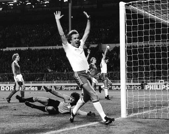 Liverpool full-back Phil Neal celebrated a Switzerland own goal at Wembley during their Group 4 qualifier for the 1982 World Cup. (PA Archive)