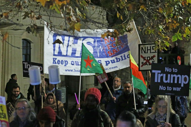 Protesters take part in a march from Trafalgar Square, London