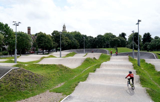 Young riders practice at the Peckham BMX Club