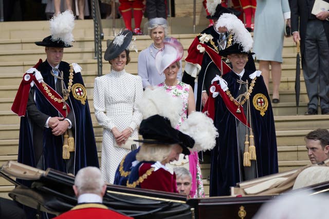 (left to right) The Prince of Wales, The Princess of Wales, the Duchess of Edinburgh and the Duke of Edinburgh watch as the King and Queen depart (Yui Mok/PA)
