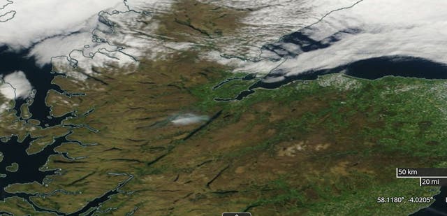 Screenshot from Nasa worldview satellite showing the plume of smoke (centre) from the fire at Cannich, in the hills above Loch Ness in the Highlands, drifting towards the loch on Monday amid clear skies 