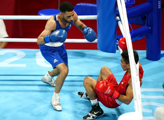 Galal Yafai (left) claimed gold in the men's flyweight on day 15